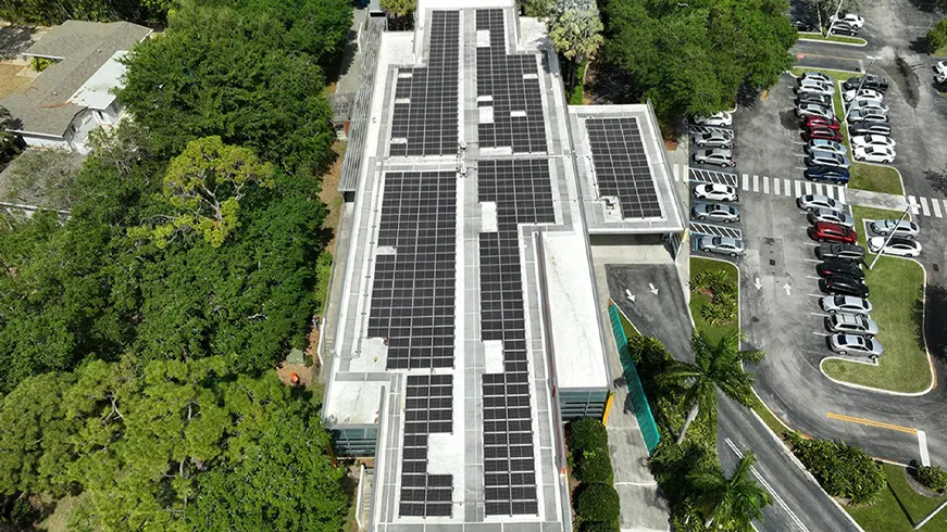 Aerial view of a commercial rooftop solar array